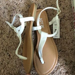 White and tan sandals